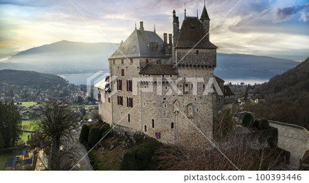 Most beautiful medieval castles of France - fairytale Menthon located near lake Annecy. aerial view 100393446