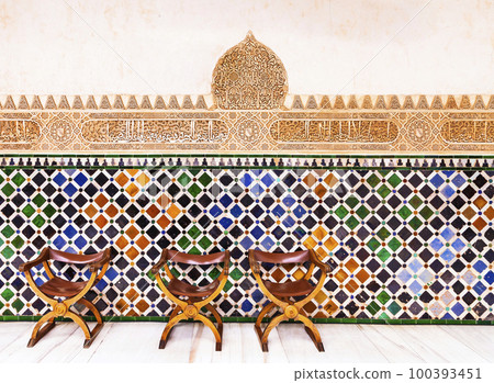 amazing Alhambra palace - mosaic and carved walls in arabian style in Granada, Andalusia, Spain 100393451