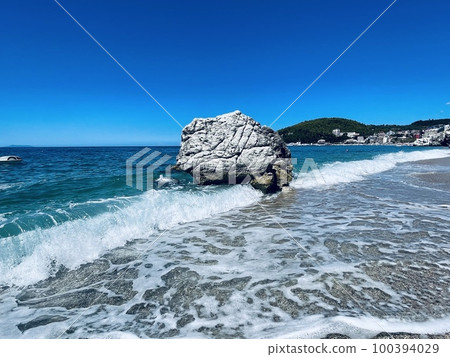 Rocky beach and crystal turquoise water of Ionian Sea in Albania. Rocky beach and crystal turquoise water of Ionian Sea in Albania. 100394029