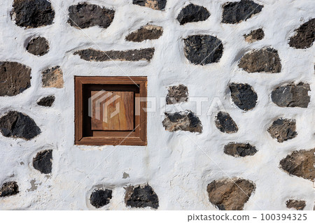 Windmill near the village of Puerto Lajas on Fuerteventura Island 100394325