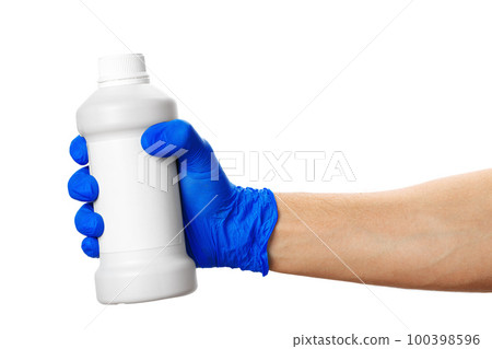 hand in a blue medical glove holds a can with pills. hand in a blue medical glove holds a can with pills. 100398596