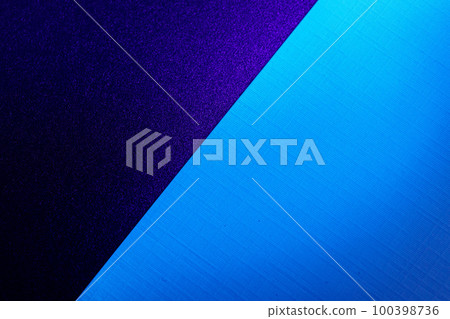Blank carton paper sheets background in dark blue light 100398736