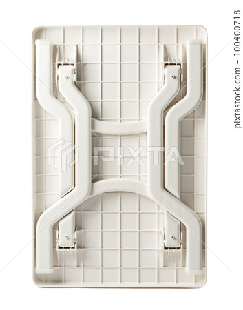 White plastic folding table isolated on white White plastic folding table isolated on white 100400718