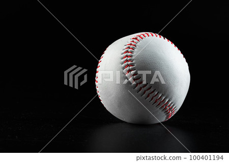 Baseball game equipment on dark black background Baseball game equipment on dark black background 100401194