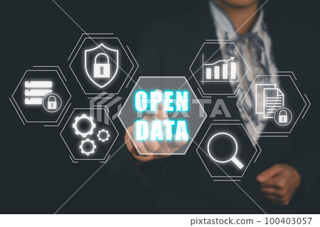 Open data concept, Business person hand touching open data icon on virtual screen. Open data concept, Business person hand touching open data icon on virtual screen. 100403057
