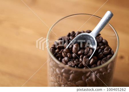 coffee beans in a glass container coffee beans in a glass container 100405262