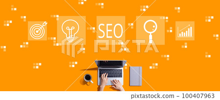 SEO concept with person working with laptop 100407963