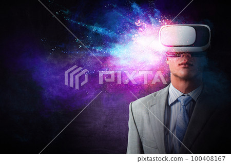 man wearing virtual reality goggles man wearing virtual reality goggles 100408167