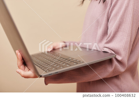 A child studying with a laptop 100408632