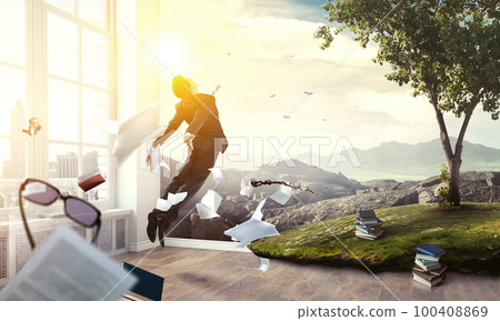 Business man flying up . Mixed media Business man flying up . Mixed media 100408869