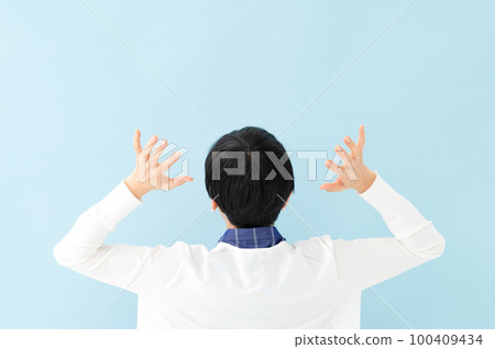 Worried woman back view Worried woman back view 100409434