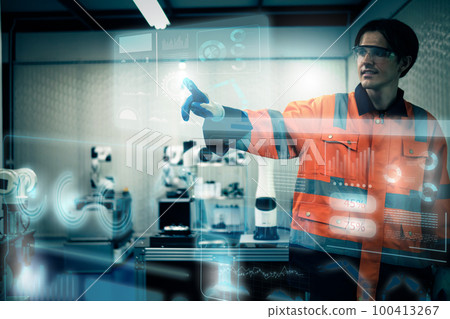 Multiracial technicial engineer training with robot arm Multiracial technicial engineer training with robot arm 100413267