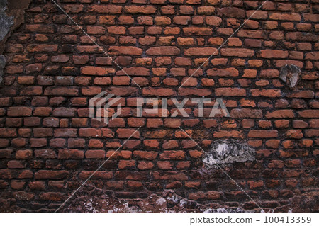 Old historical building brick wall grunge pattern texture can be used as a background wallpaper Old historical building brick wall grunge pattern texture can be used as a background wallpaper 100413359