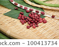 Harvesting cowpea beans 100413734