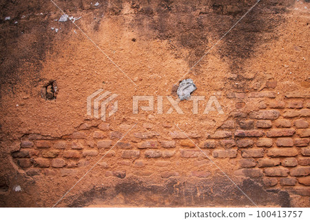 Old brick wall red plaster texture can be used as a background wallpaper Old brick wall red plaster texture can be used as a background wallpaper 100413757