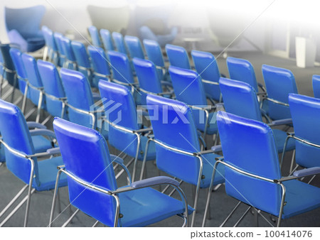 blue chairs in ordinary empty waiting room. Selective focus blue chairs in ordinary empty waiting room. Selective focus 100414076