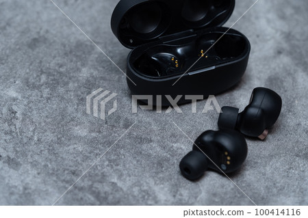 Wireless earphones and copy space Wireless earphones and copy space 100414116