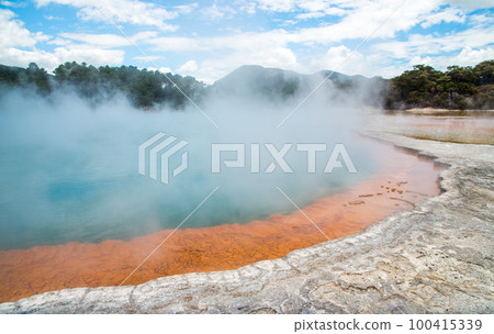 Champagne pool an iconic tourist attraction of Wai-O-Tapu the geothermal wonderland in Rotorua, New Zealand. Champagne pool an iconic tourist attraction of Wai-O-Tapu the geothermal wonderland in Rotorua, New Zealand. 100415339