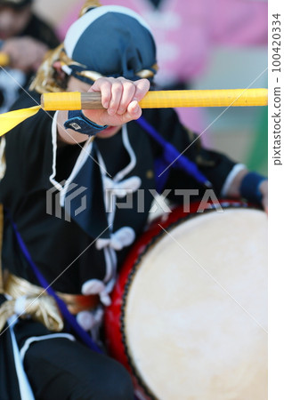 Drumsticks during the Okinawan Eisa Dance 100420334