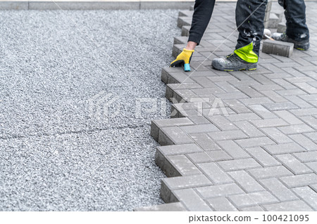 new sidewalk made of concrete interlocking paving blocks 100421095