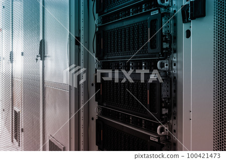 Data center with a row of server racks Data center with a row of server racks 100421473