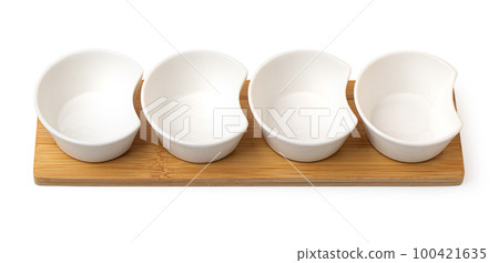 set of white ceramic saucers 100421635