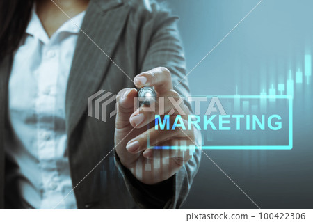 Businesswoman with a pen and marketing text Businesswoman with a pen and marketing text 100422306