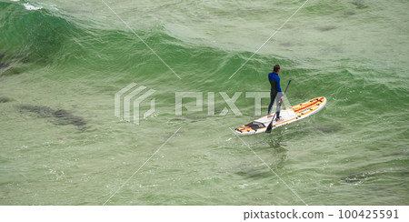 Surfing Waves, Beach of Vidiago, Asturias, Spain Surfing Waves, Beach of Vidiago, Asturias, Spain 100425591