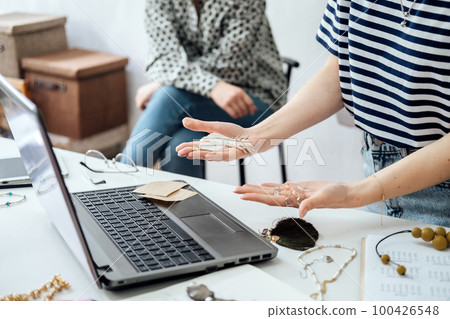 Jewelry Design: Learn the art of designing jewelry, including sketching, selecting materials, and creating prototypes. Female designer makes and design jewelry in workshop Jewelry Design: Learn the art of designing jewelry, including sketching, selecting materials, and creating prototypes. Female designer makes and design jewelry in workshop 100426548