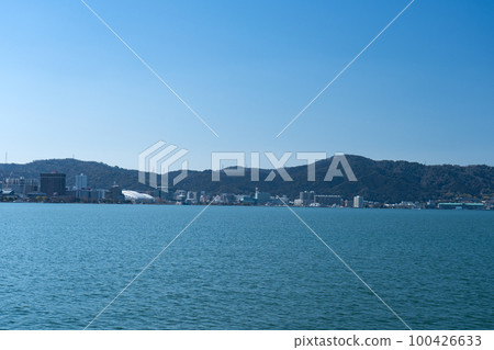 Otsu city area on the opposite shore as seen from Yabashi Kihojima Park 100426633
