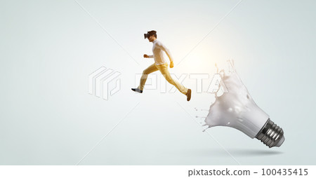Man wearing virtual reality goggles Man wearing virtual reality goggles 100435415