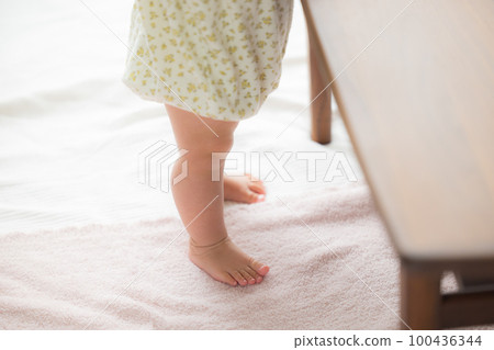 Baby standing up Baby standing up 100436344