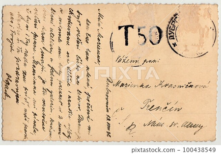 Back of a vintage photo - used postcard. Rich stain and paper details. Can be used as background. Image contains handwriting. Back of a vintage photo - used postcard. Rich stain and paper details. Can be used as background. Image contains handwriting. 100438549