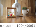 Colorful hourglasses with blurred background cute concept 100440061