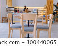 Coffee shops with tables are empty by noon. 100440065