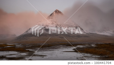 Rocky Mountain Peaks during golden sunset sky. Rocky Mountain Peaks during golden sunset sky. 100441704