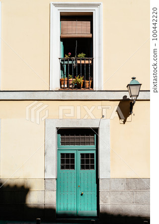 Facade of old residential building in central Madrid 100442220