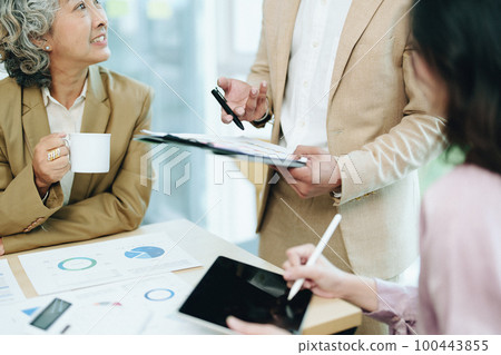 Asian entrepreneurs and business people meeting in a conference room in business planning, financial budget and investment risk assessment to analyze customer groups to increase company growth. Asian entrepreneurs and business people meeting in a conference room in business planning, financial budget and investment risk assessment to analyze customer groups to increase company growth. 100443855