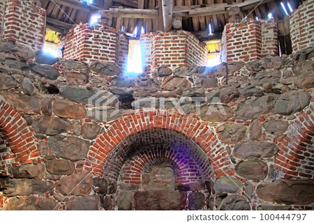 Old fortress tower of 17th century. Northern Russian style Old fortress tower of 17th century. Northern Russian style 100444797