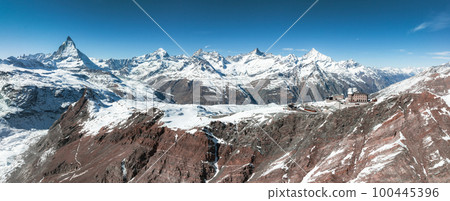 Beautiful Zermatt ski resort with view of the Matterhorn peak on the horizon. Beautiful Swiss Alps. Beautiful Zermatt ski resort with view of the Matterhorn peak on the horizon. Beautiful Swiss Alps. 100445396
