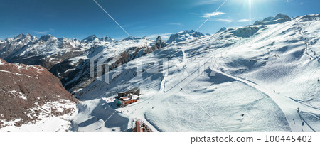 Beautiful Zermatt ski resort with view of the Matterhorn peak on the horizon. Beautiful Swiss Alps. 100445402