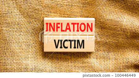 Inflation victim symbol. Concept words Inflation victim on wooden block. Beautiful canvas table canvas background. Business inflation victim concept. Copy space. Inflation victim symbol. Concept words Inflation victim on wooden block. Beautiful canvas table canvas background. Business inflation victim concept. Copy space. 100446449