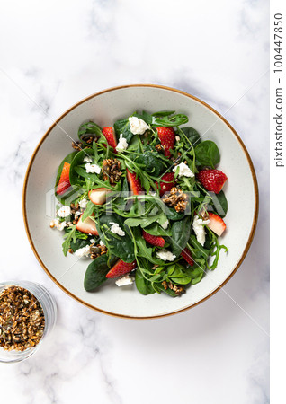 Green Salad with Strawberries, Feta Cheese, Seeds 100447850