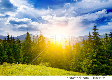 Picturesque sunrise on background of beautiful mountains 100449409