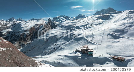 Beautiful Zermatt ski resort with view of the Matterhorn peak on the horizon. Beautiful Swiss Alps. 100450579
