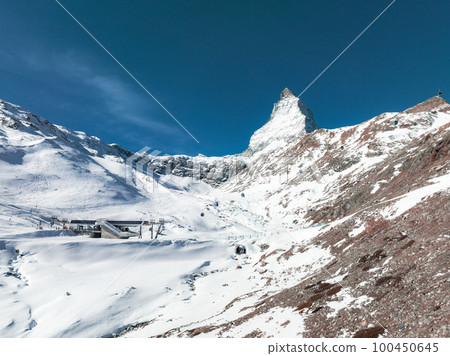 Beautiful Zermatt ski resort with view of the Matterhorn peak on the horizon. Beautiful Swiss Alps. Beautiful Zermatt ski resort with view of the Matterhorn peak on the horizon. Beautiful Swiss Alps. 100450645