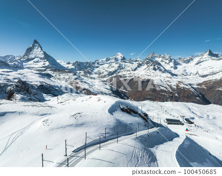 Beautiful Zermatt ski resort with view of the Matterhorn peak on the horizon. Beautiful Swiss Alps. Beautiful Zermatt ski resort with view of the Matterhorn peak on the horizon. Beautiful Swiss Alps. 100450685