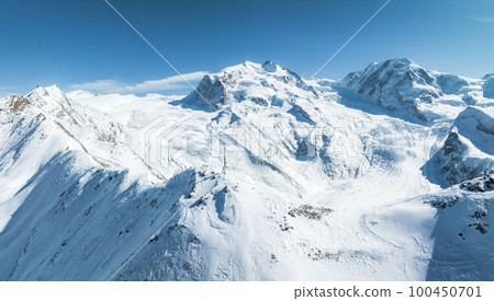 Beautiful Zermatt ski resort with view of the Matterhorn peak on the horizon. Beautiful Swiss Alps. Beautiful Zermatt ski resort with view of the Matterhorn peak on the horizon. Beautiful Swiss Alps. 100450701