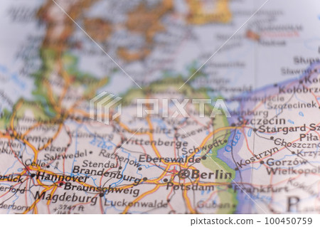 Close up of a colorful map focusing on Berlin, Germany through selective focus, background blur. Close up of a colorful map focusing on Berlin, Germany through selective focus, background blur. 100450759