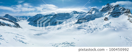 Aerial view of Great Aletsch Glacier, the largest glacier in the Alps and UNESCO heritage, in Canton of Valais, Switzerland. Aletsch glacier - ice panorama landscape in Alps of Switzerland, Europe Aerial view of Great Aletsch Glacier, the largest glacier in the Alps and UNESCO heritage, in Canton of Valais, Switzerland. Aletsch glacier - ice panorama landscape in Alps of Switzerland, Europe 100450992